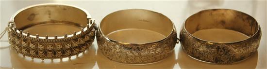 Three silver bracelets